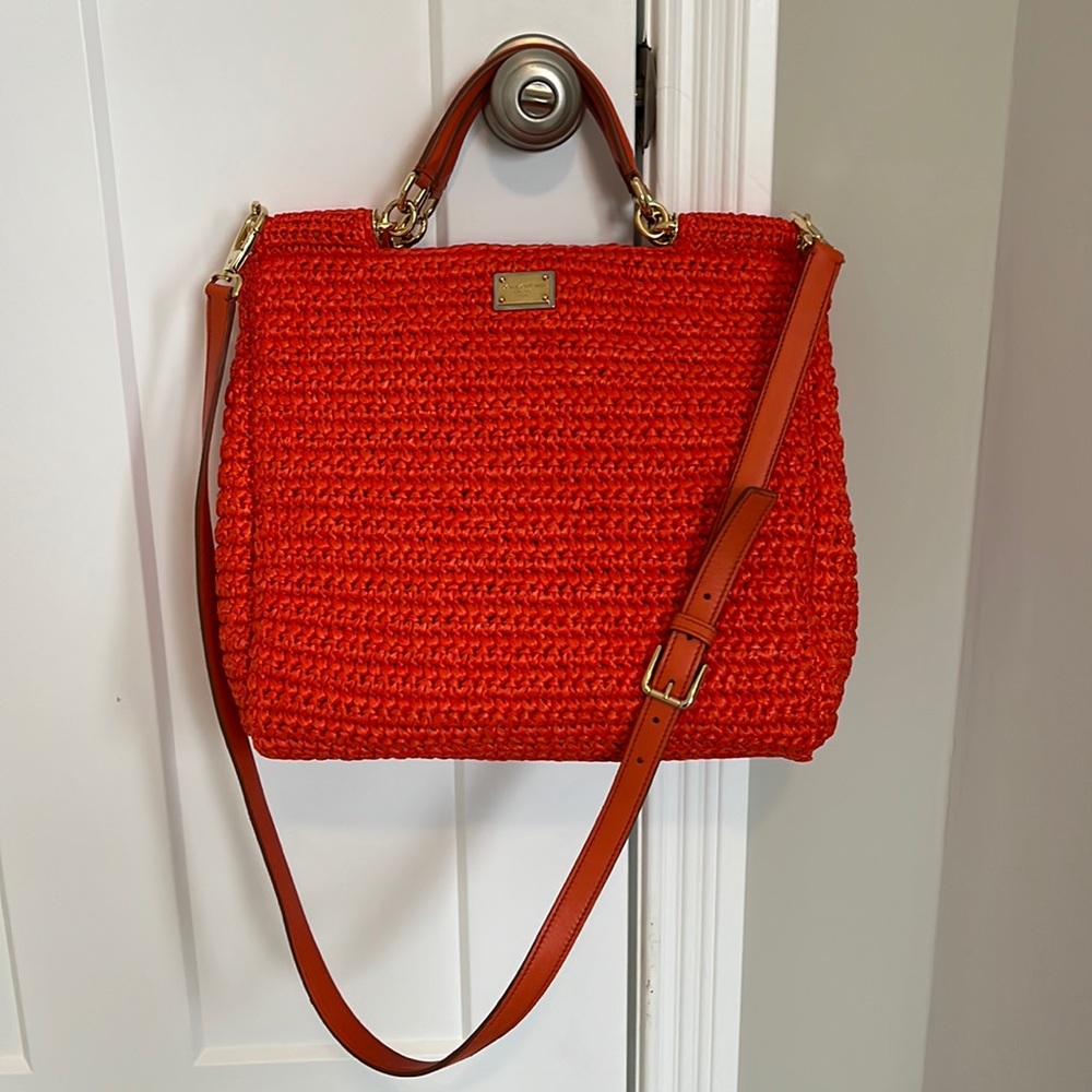 Dolce & Gabbana like new orange raffia handbag.